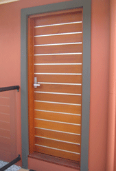 Horizontal Metal Strip and Timber Door