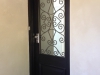 Entrance Door with Trans Laminate and Black Wrought Iron Insert
