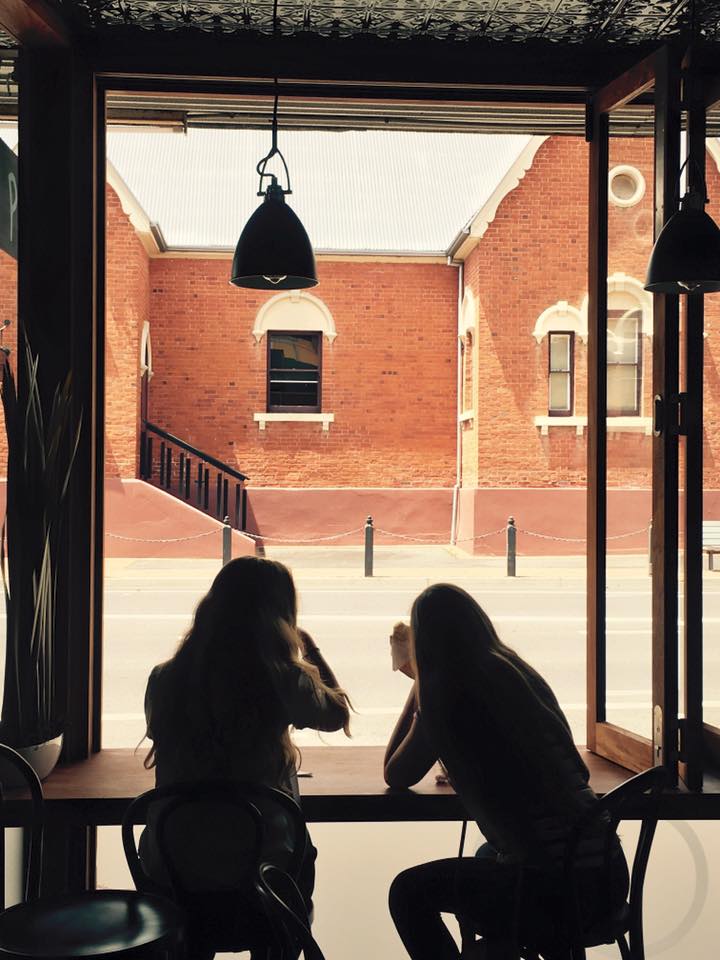 happy customers at a servery window